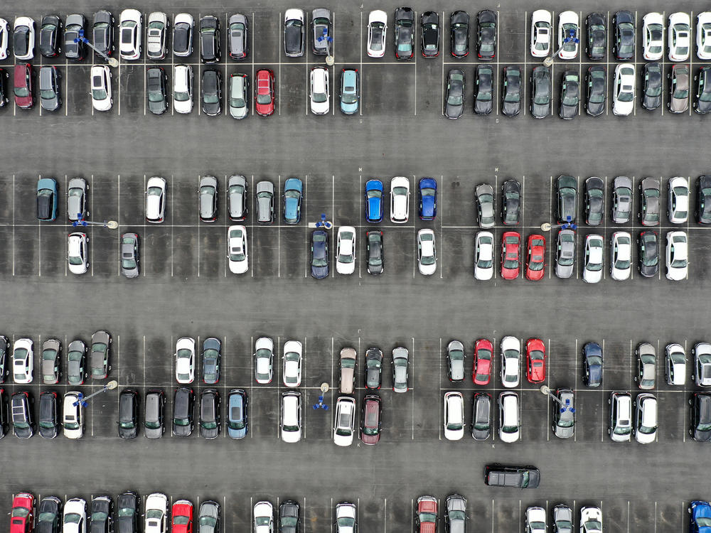 A CarMax lot holds hundreds of used cars and trucks  in Gaithersburg, Md. on April 12. Used car prices have fallen from their recent peaks, but they remain extraordinarily high compared to just a few years ago. And other costs of car ownership are rising, too.