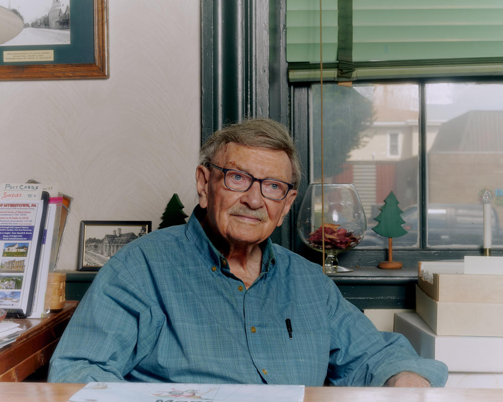 Brown poses for a portrait inside his home.