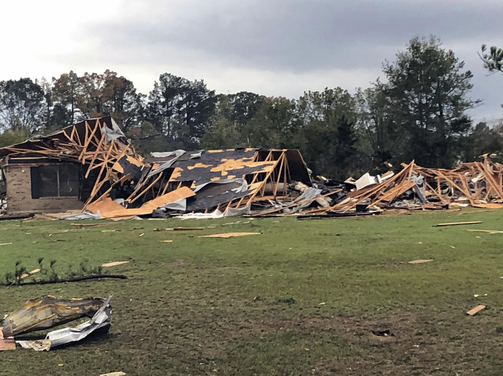Scenes of devastation are visible in all directions along Lamar County Road 35940, west of State Highway 271, after a massive tornado hit the area, causing extensive damage and destroying an unknown number of homes, Friday, Nov. 4, 2022 in Powderly, Texas.