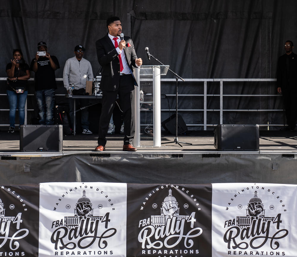 Host of the Rally 4 Reparations Tariq Nasheed speaks to the crowd.
