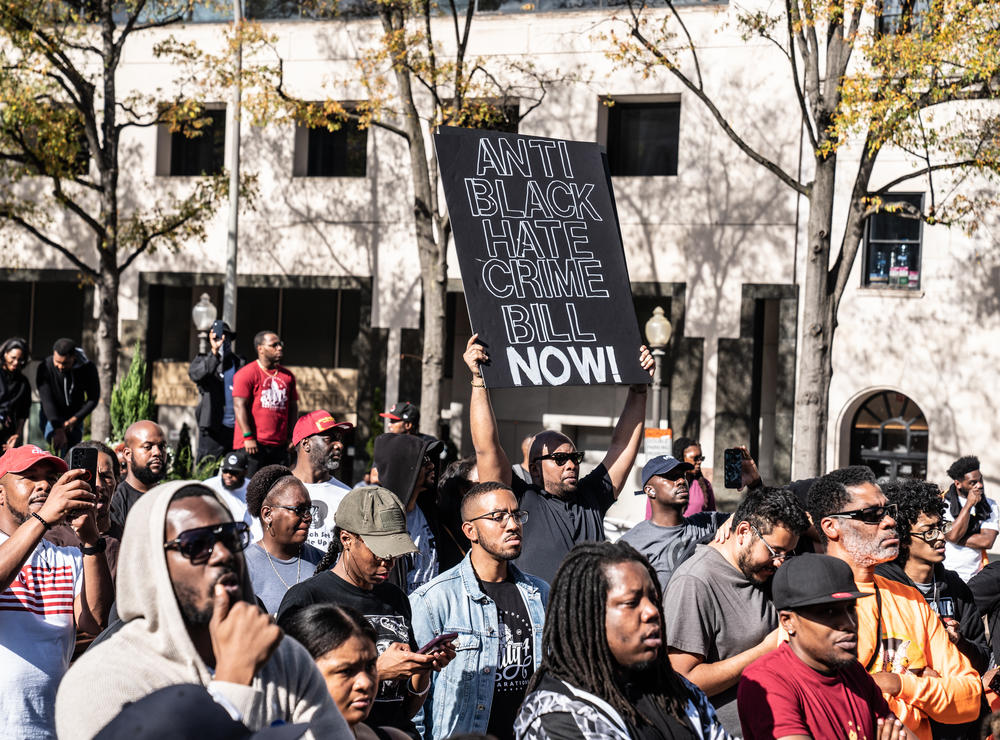 Rally 4 Reparations attendees listen to Dr. Kaba Kamene deliver his speech.