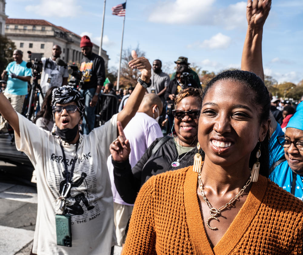 Rally 4 Reparations attendees work to raise awareness about reparations.