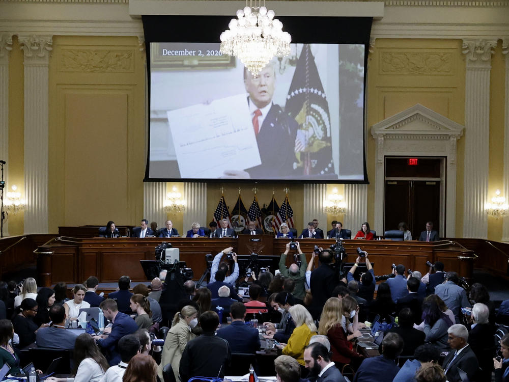 The U.S. House Select Committee to Investigate the January 6 Attack on the U.S. Capitol displays a video of former President Donald Trump at a hearing on Oct. 13.