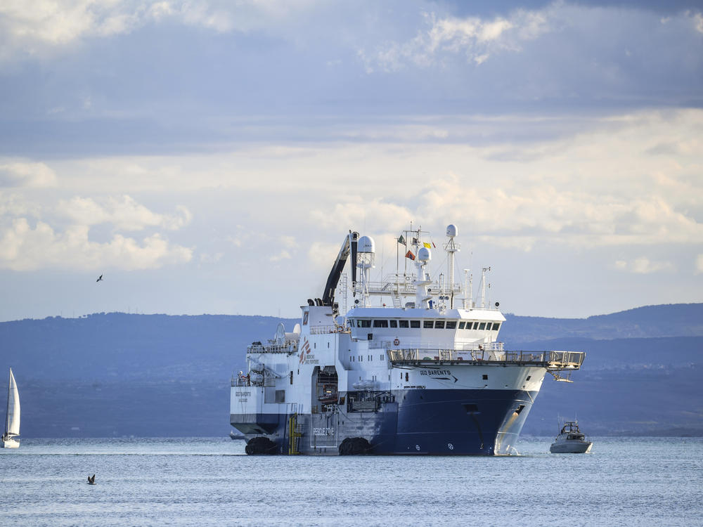 The Norway-flagged Geo Barents rescue ship carrying nearly 600 migrants arrives at Catania's port in Sicily on Sunday.