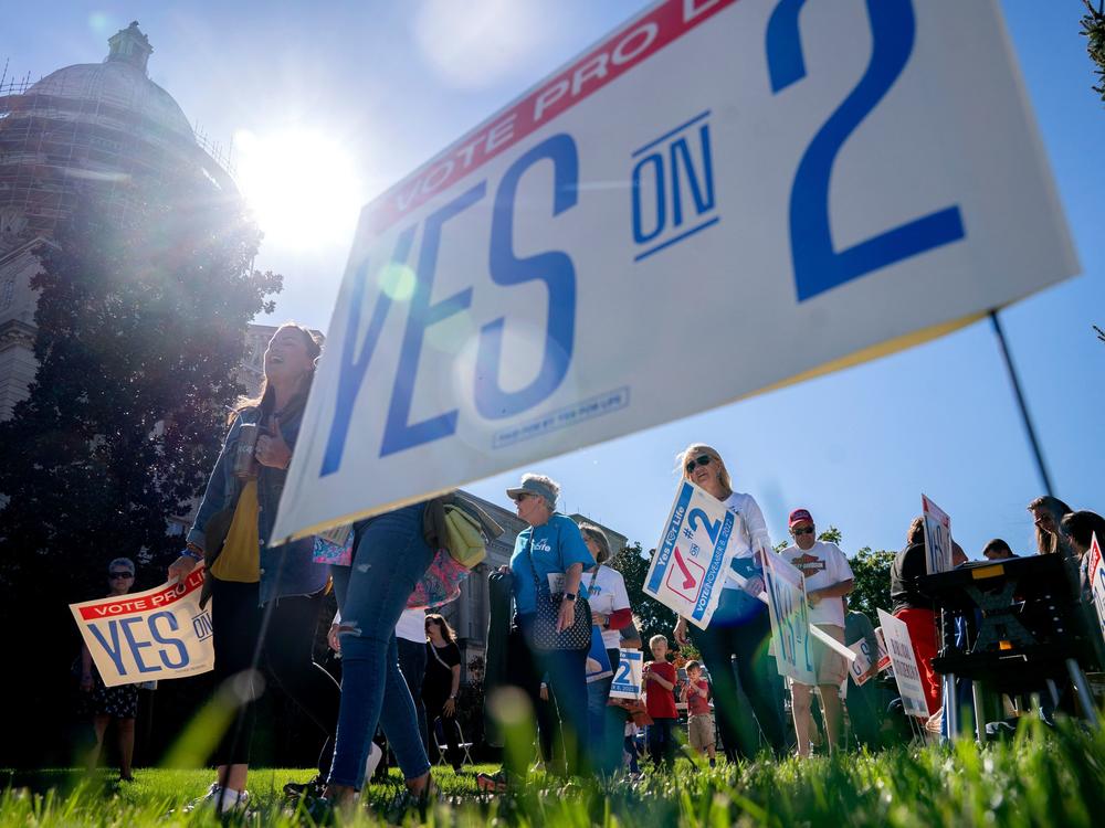 Attendees march during a rally encouraging voters to vote yes on Amendment 2, which would add a permanent abortion ban to Kentucky's state constitution at the state Capitol in Frankfort, Kentucky, on October 1, 2022.