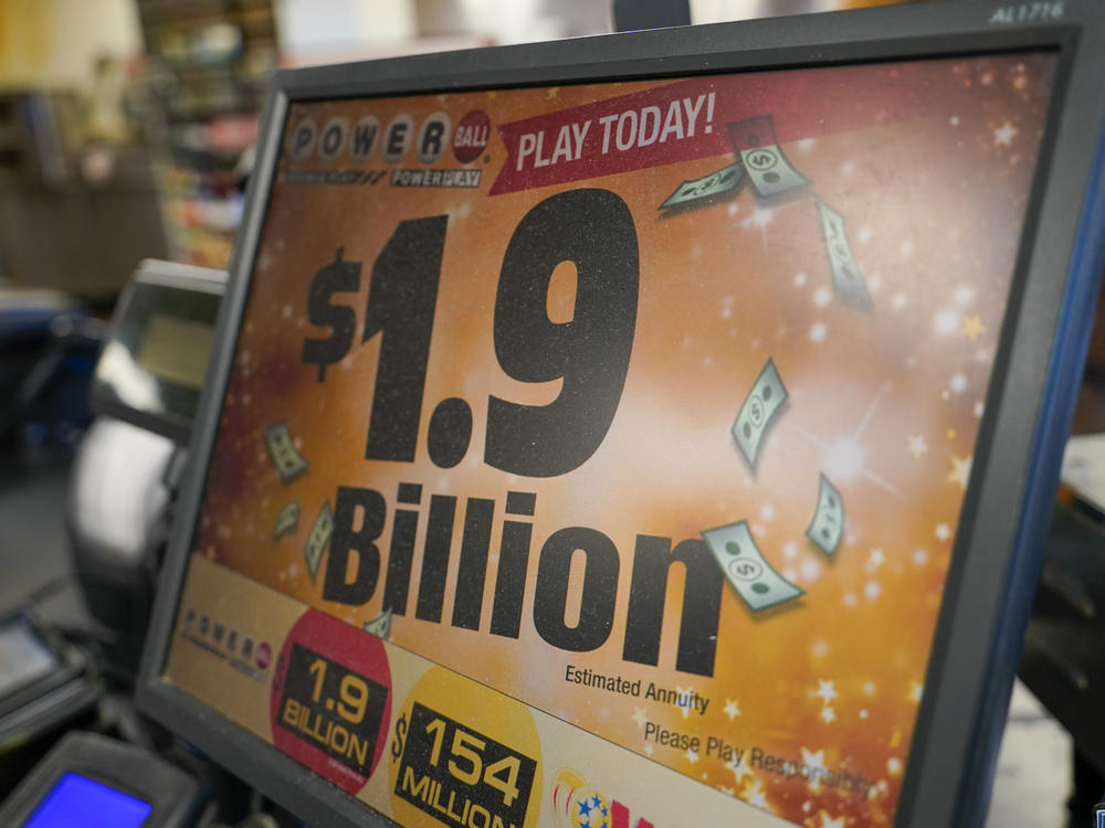 The display panel advertising the tickets for the Monday Powerball drawing with an annuity value of at least $1.9 billion, are shown at a convenience store, Monday, Nov. 7, 2022, in Renfrew, Pa.