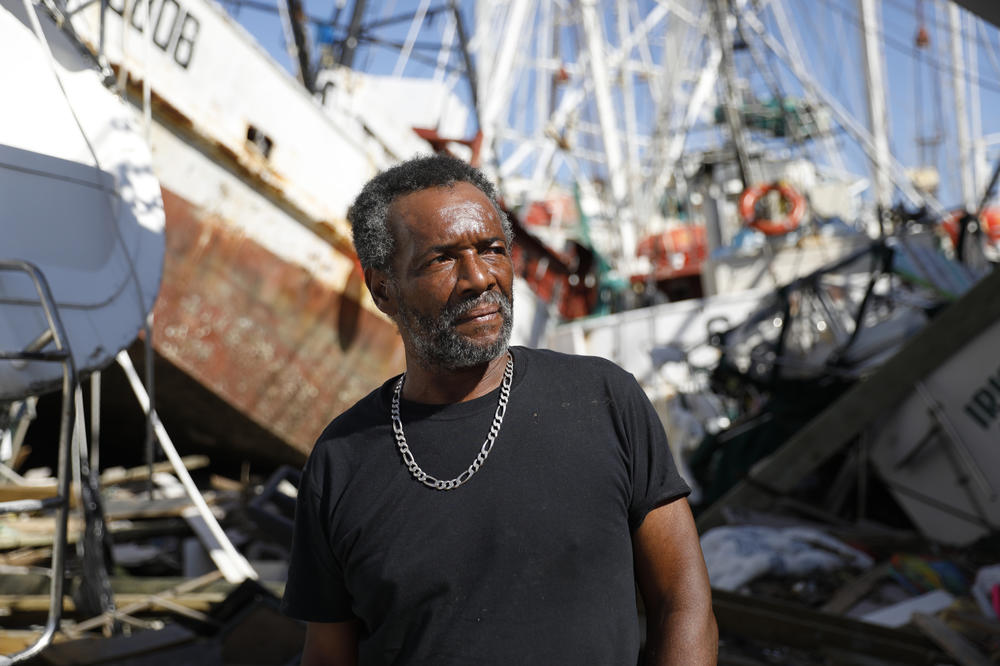 Ricky Moran, an experienced shrimp boat captain who works from the shrimp boat docks on San Carlos Island near Fort Myers Beach, Fla., poses for a portrait on Saturday, Oct. 28, 2022.