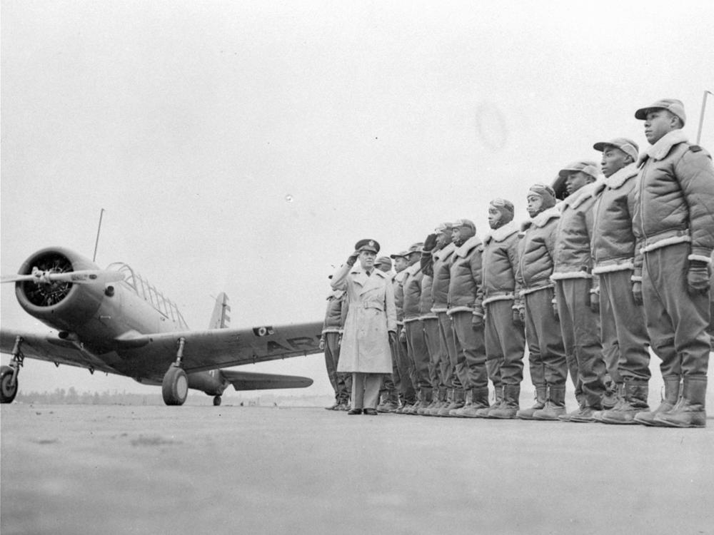 Members of the all-Black aviation squadron known as the Tuskegee Airmen line up Jan. 23, 1942.