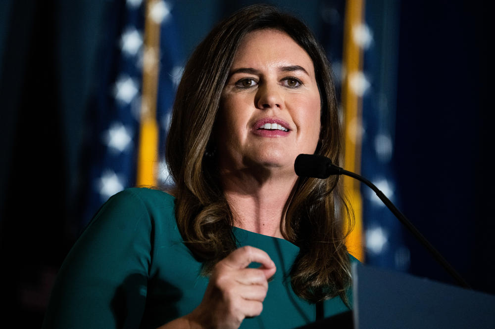 Sarah Huckabee Sanders, former Trump White House press secretary, addresses the America First Policy Institute's America First Agenda Summit at the Marriott Marquis on July 26.