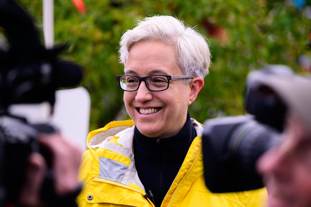 Democratic gubernatorial nominee Tina Kotek speaks with members of the media before casting her ballot at a ballot drop box on Nov. 2 in Portland, Ore.