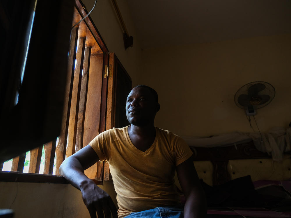 Mamadou Niang at his home in Gandiol, Senegal, on Oct. 6. Mamadou's father worked their family farmland until he died in 2006, and Mamadou would have liked to follow in his footsteps. But he can't, he says, because rising seas are pushing salt water into the fields.