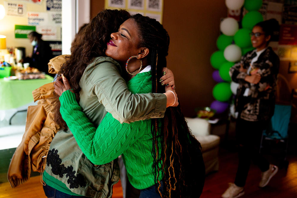 U.S. Rep. Cori Bush, right, hugs St. Louis Board of Alderman presidential candidate Megan Green on Saturday, Nov. 5, 2022, at Green's campaign headquarters in the Central West End.