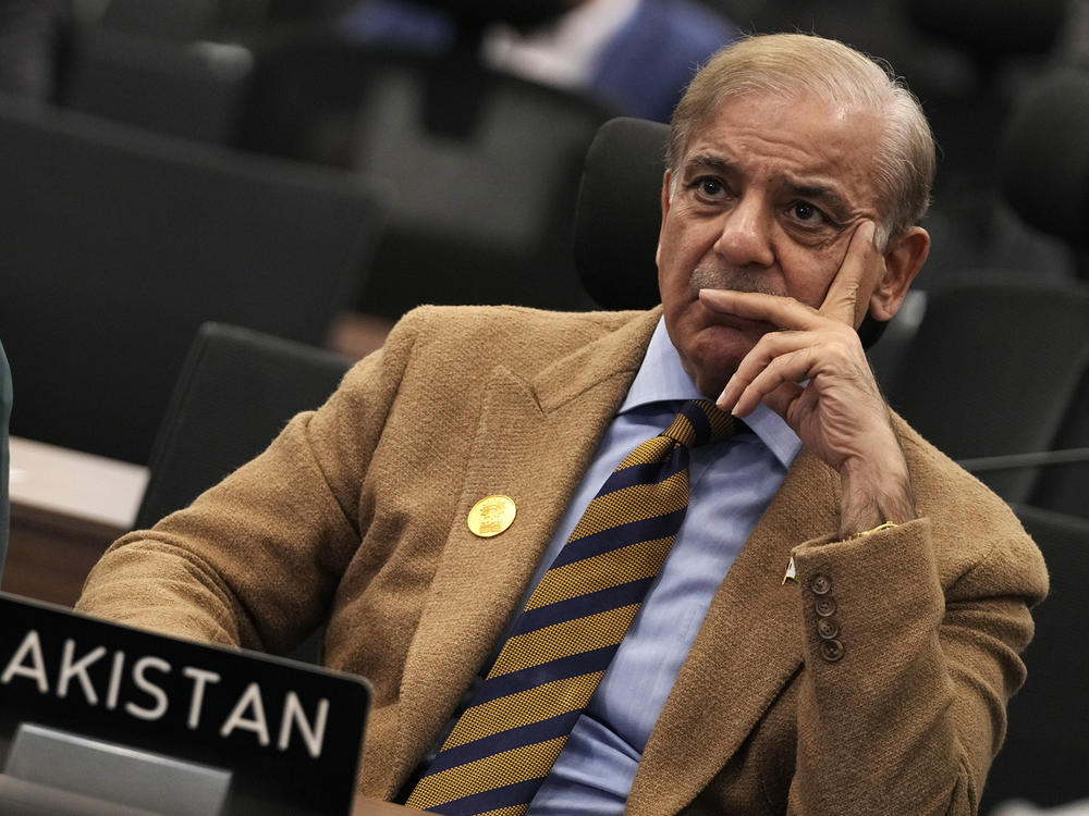Muhammad Shehbaz Sharif, prime minister of Pakistan, listens to speeches during the conference. He took the stage today, as well, explaining the impact of catastrophic flooding in Pakistan this summer.
