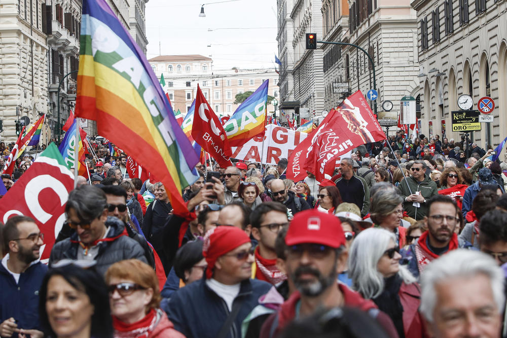 Demonstrators attend an anti-war rally in Rome on Saturday. According to organizers, more than 100,000 people marched in Rome to ask for peace in Ukraine.