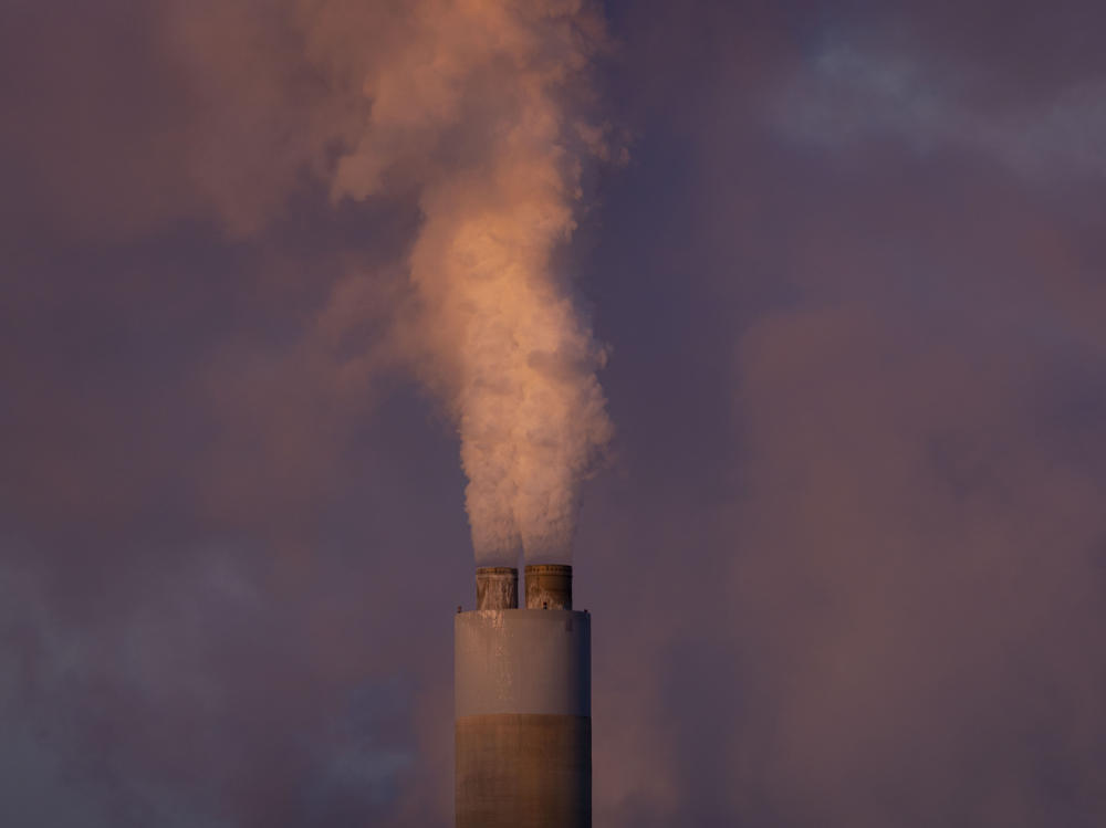 Carbon dioxide and other pollutants billows from a stack at PacifiCorp's coal-fired Naughton Power Plant, near where Bill Gates company, TerraPower plans to build an advanced, nontraditional nuclear reactor, Thursday, Jan. 13, 2022, in Kemmerer, Wyo.