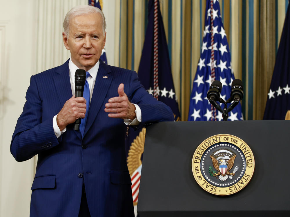 President Biden takes questions from reporters at the White House on Wednesday.