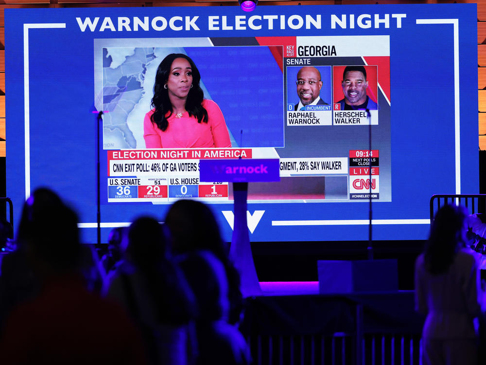 Sen. Raphael Warnock's election night party in Atlanta, Nov. 8, 2022. The race between Warnock and Republican candidate Herschel Walker is too close to call and will go to a runoff election in December.