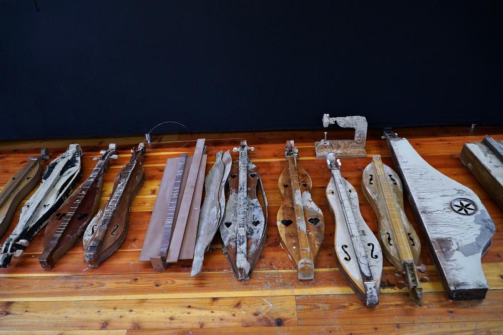 Damaged instruments from the Museum of the Mountain Dulcimer line the upper floor of Hindman's Appalachian Artisan Center.