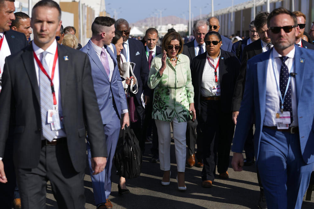 Speaker of the House Nancy Pelosi, D-Calif., walks through the COP27 U.N. Climate Summit.
