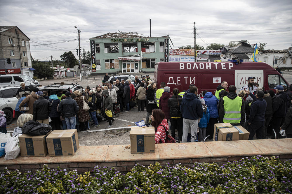 Humanitarian aid is distributed in Balakliya following the retreat of Russian troops from Ukraine's Kharkiv region, on Sept. 11.