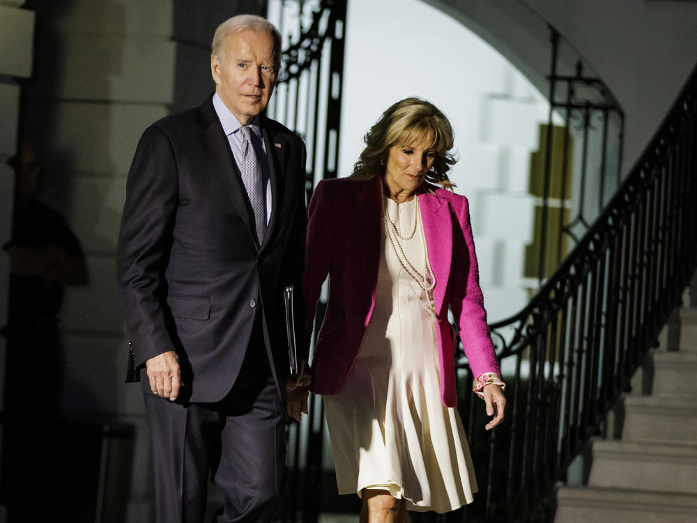 President Biden and first lady Jill Biden walk toward Marine One on the South Lawn of the White House on Nov. 7.