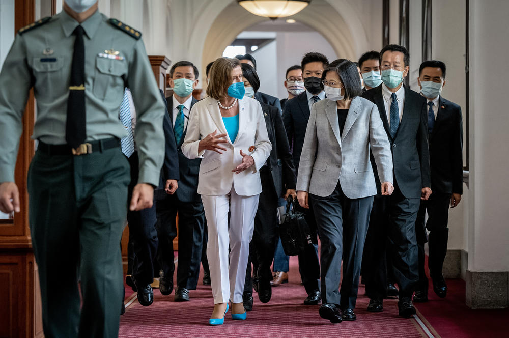House Speaker Nancy Pelosi speaks with Taiwan's President Tsai Ing-wen after arriving at the president's office in Taipei on Aug. 3.
