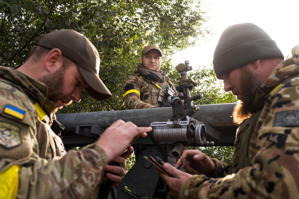 Ukrainian soldiers prepare to send rockets from the edge of the Kherson region to hit targets in part of the region occupied by Russia in October.