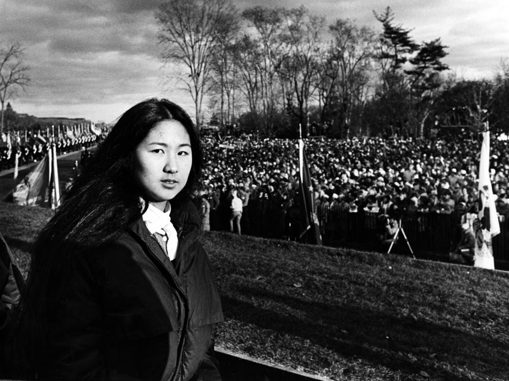 Maya Lin, architect of the Vietnam Memorial stands during the dedication on Nov. 13, 1982.