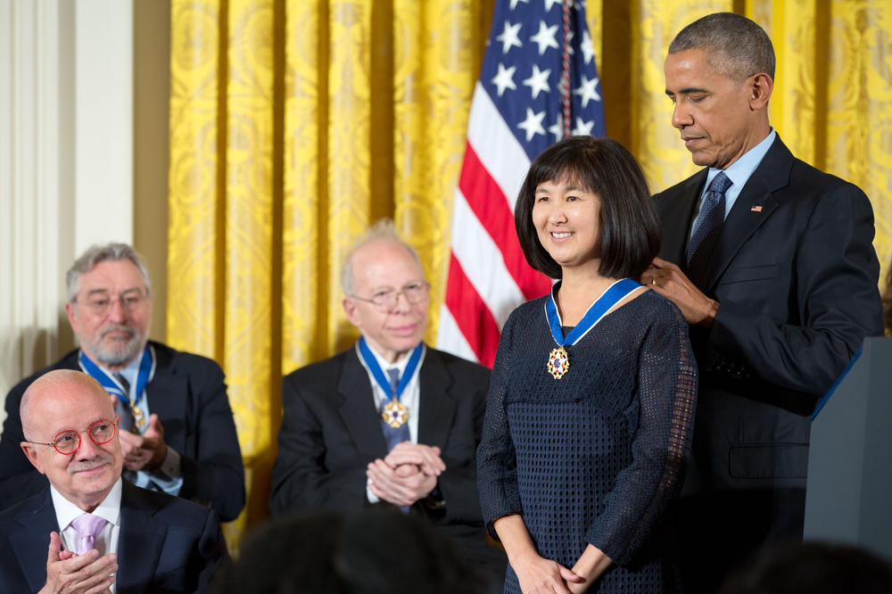 President Barack Obama presents the Presidential Medal of Freedom to Maya Lin during a ceremony in the East Room of the White House, Nov. 22, 2016.