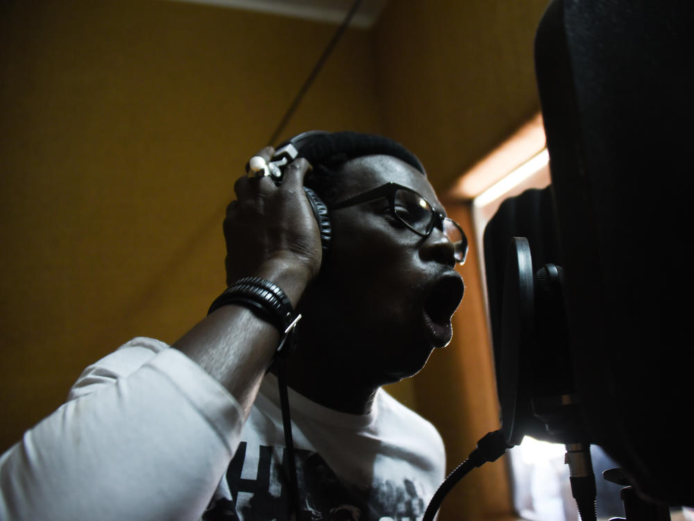 Babacar Niang, known as Matador, raps at a recording studio at one of Africulturban's facilities in Pikine, Senegal on April 26, 2018.