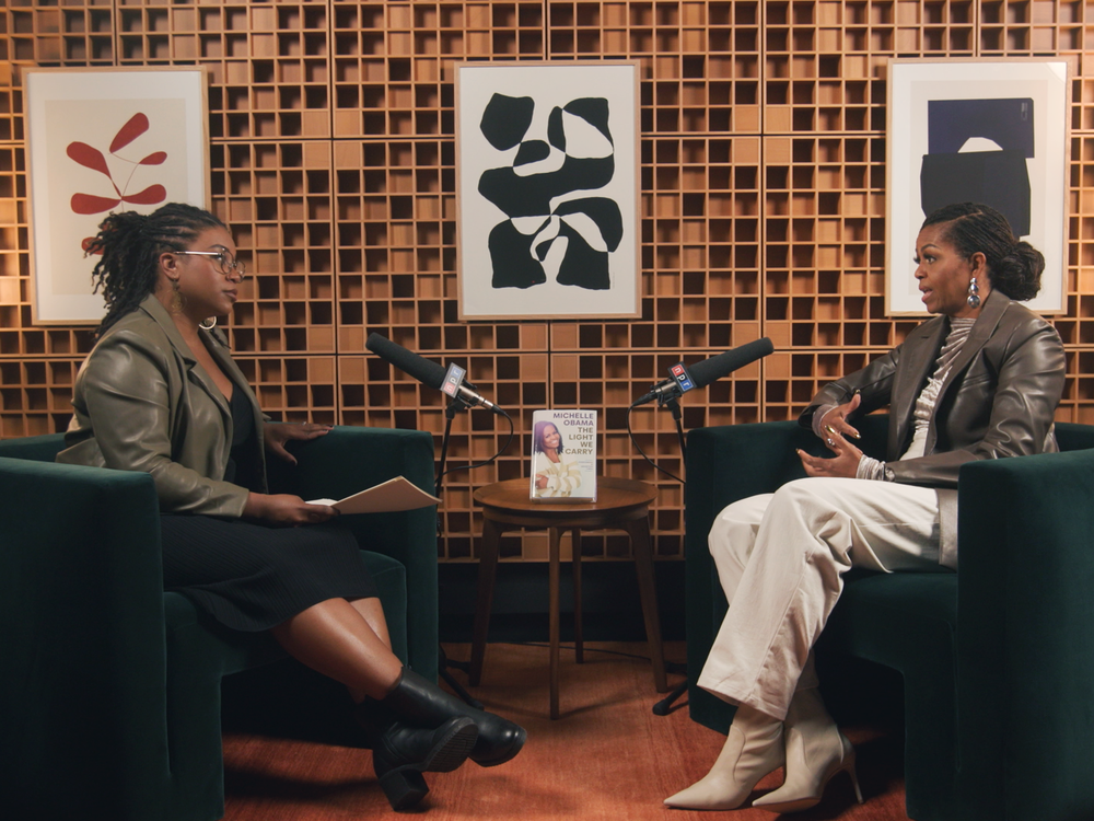 NPR <em>All Things Considered</em> host Juana Summers (left) speaks with former First Lady Michelle Obama about her new book, <em>The Light We Carry.</em>