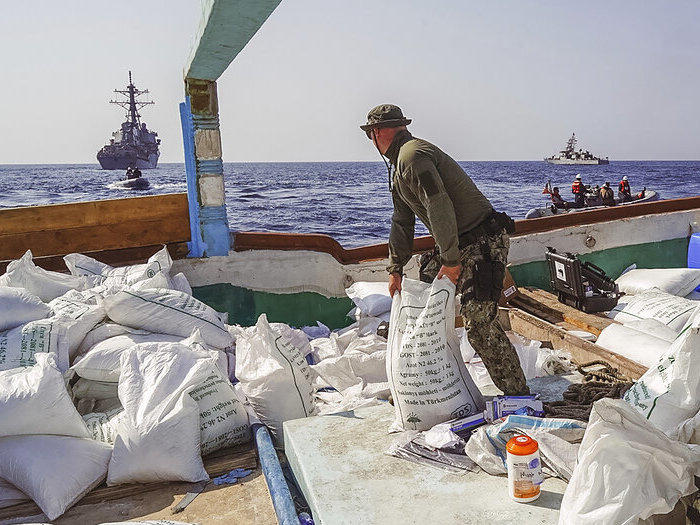 Sailors inventory urea and ammonium perchlorate found on a dhow intercepted in the Gulf of Oman. The U.S. Navy says it found 70 tons of a missile fuel component hidden among bags of fertilizer aboard a ship bound to Yemen from Iran.