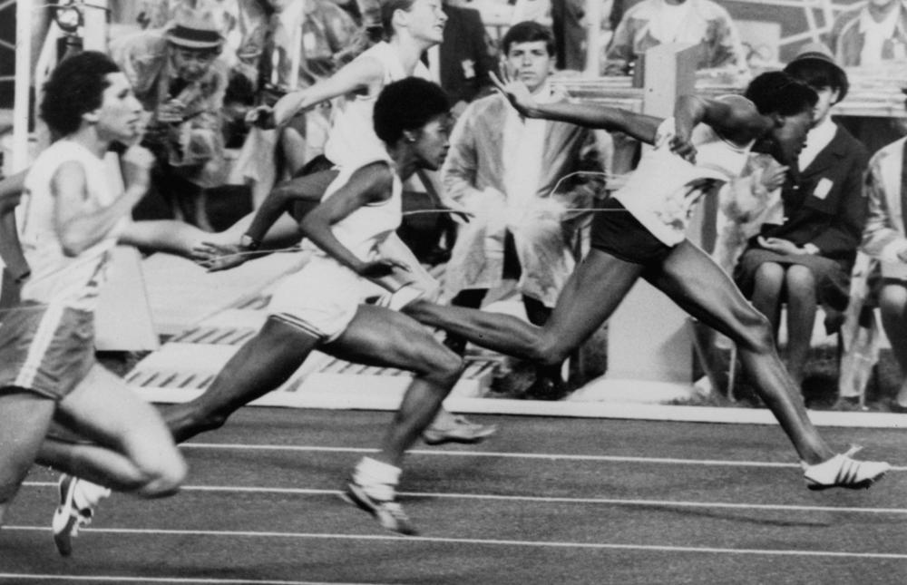 Wyomia Tyus breaks the tape to win the women's 100-meter Olympic final, October 15, 1968, in Mexico City, beating out teammate Barbara Ferrell, center, who was second, and Irena Szewinski, left, of Poland who was third. Tyus's time of 11.0 seconds, bettered the official world and Olympic records.