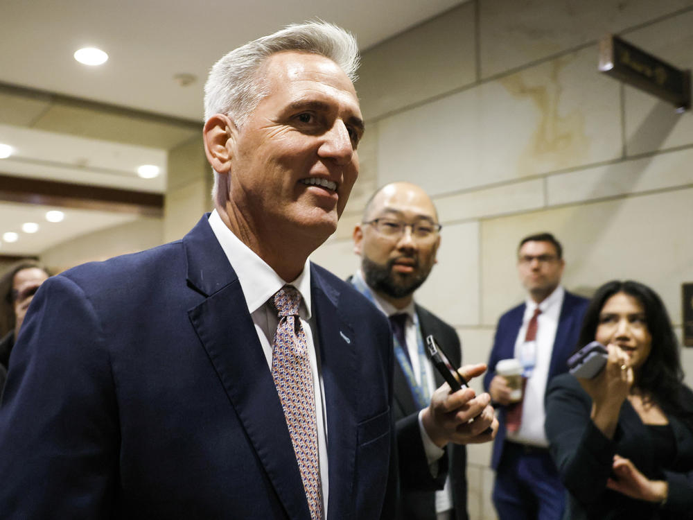 House Minority Leader Kevin McCarthy, R-Calif., is followed by reporters as he arrives to a House Republican Caucus meeting at the Capitol on Monday.
