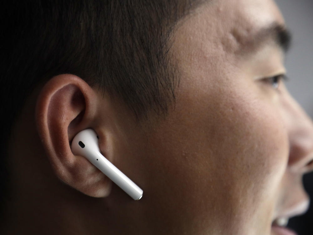 Apple AirPods are demonstrated during an event to announce new products on Wednesday, Sept. 7, 2016, in San Francisco.