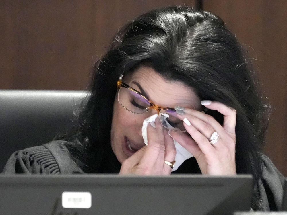 Waukesha County Circuit Court Judge Jennifer Dorow wipes away tears while talking about victim statements during her closing remarks before sentencing Darrell Brooks to six consecutive life sentences in a Waukesha County Circuit Court in Waukesha, Wis., on Wednesday, Nov. 16, 2022.