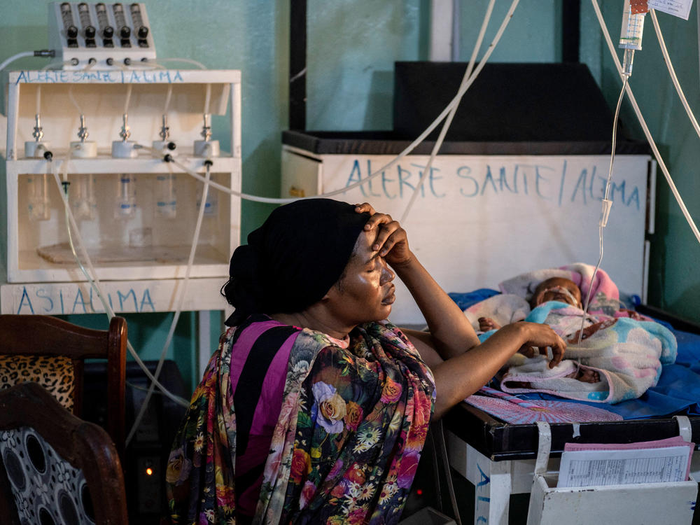 Zania Muhammed comforts her malnourished son, Mazzam Brahim, in the emergency section for critical care patients at a hospital in N'djamena, Chad. The war in Ukraine has caused food prices to skyrocket, leaving many without enough to eat.