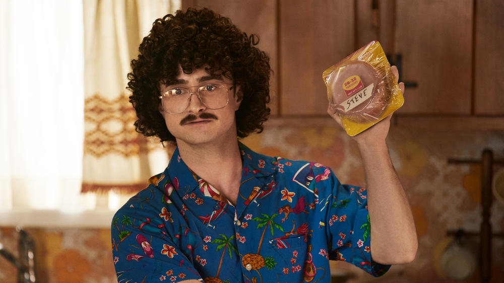 Daniel Radcliffe stars as Yankovic in the film <em>Weird</em>.