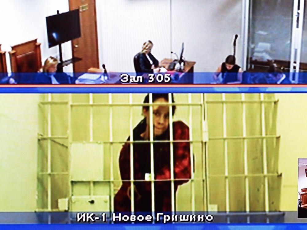U.S. basketball player Brittney Griner, who was sentenced to nine years in a Russian penal colony in August for drug smuggling, is seen on a screen via a video link from a remand prison during a court hearing to consider an appeal against her sentence, at the Moscow regional court on Oct. 25.