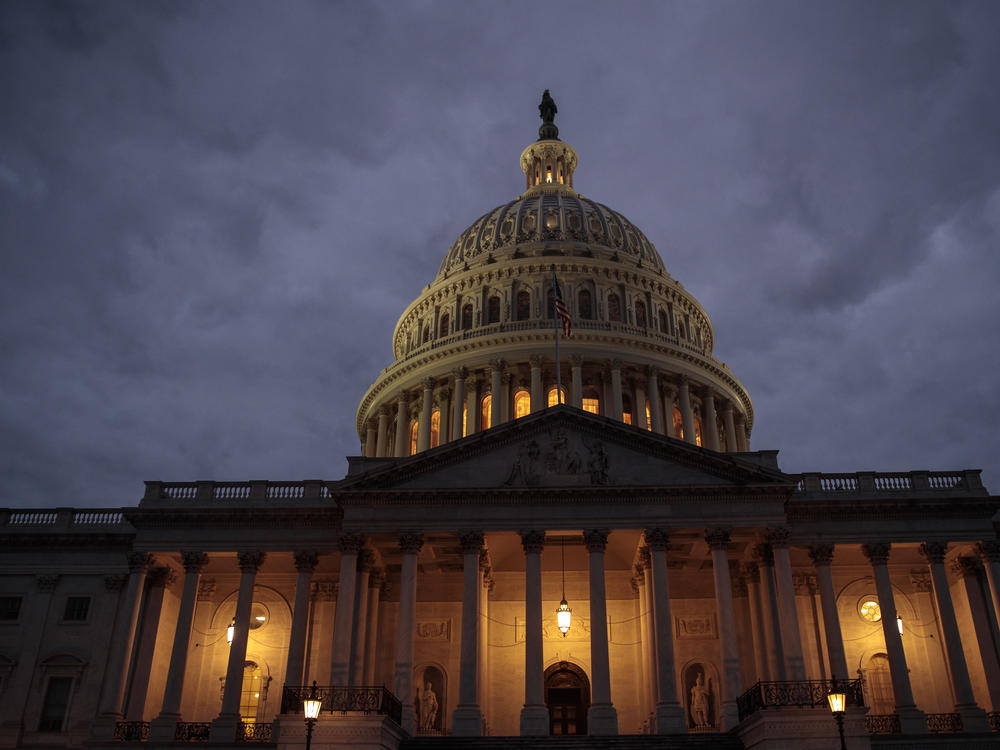 The U.S. Capitol is seen at dusk, January 21, 2018 in Washington, DC.