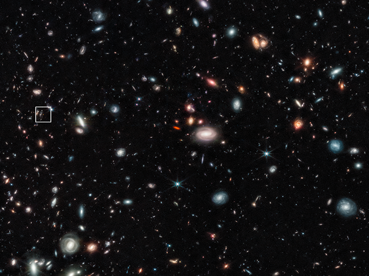 The small red dot highlighted inside the white box on this James Webb Space Telescope image is an early galaxy, seen as it looked just 350 million years after the Big Bang.
