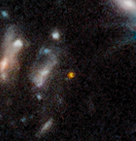 The reddish dot is a newly discovered galaxy seen as it was 350 million years after the Big Bang.