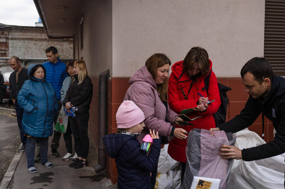 The International Rescue Committee hands out blankets and other winter gear to people in need in Dnipro, Ukraine, in October.