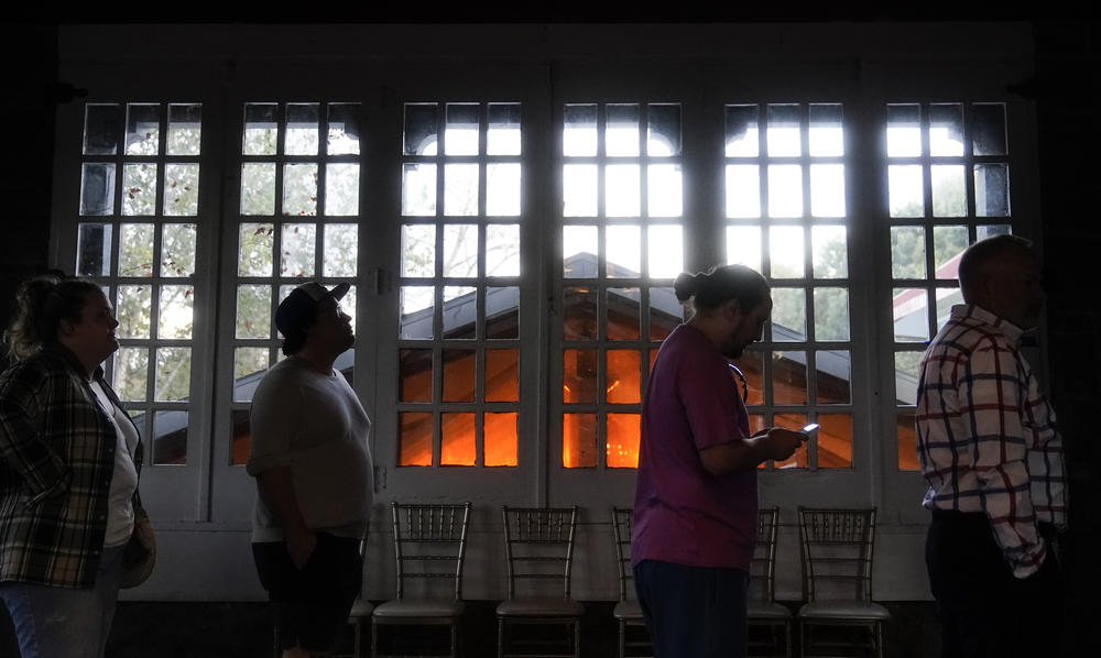 People wait in line to vote on Election Day in Atlanta.