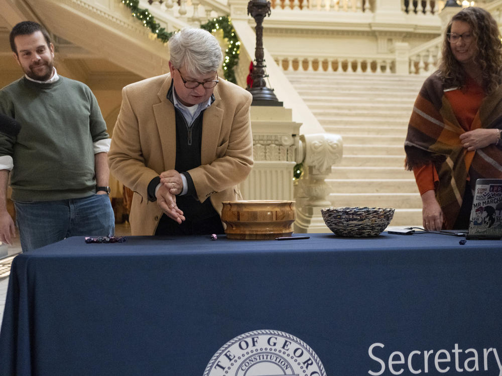 On Wednesday in Atlanta, Gabriel Sterling, chief operating officer for the Georgia secretary of state, rolls a 10-sided die as part of process to determine which batches of ballots to audit for a statewide risk limiting audit of the 2022 general election.