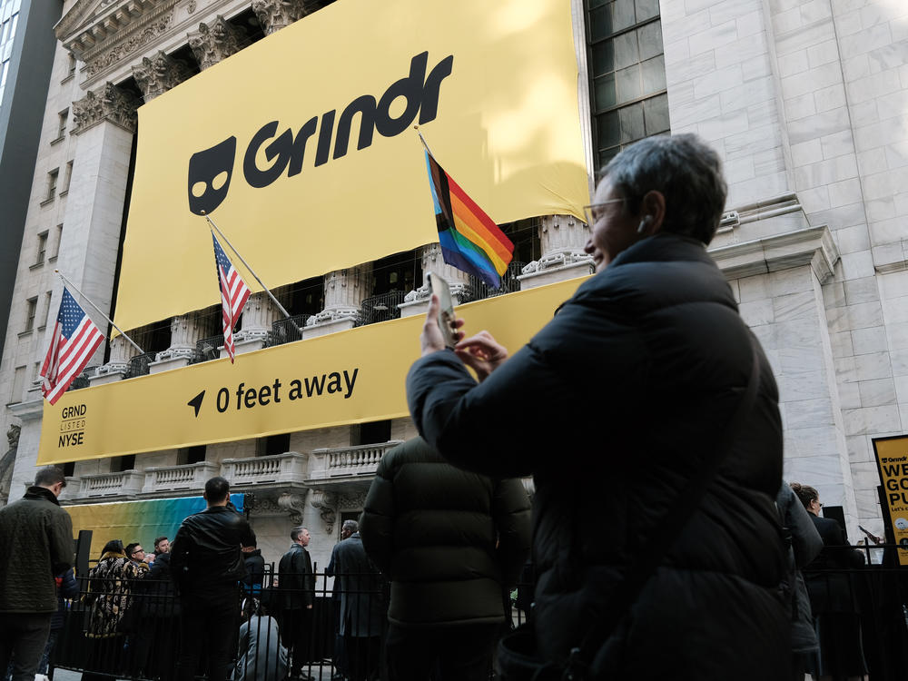 Grindr puts on a public show outside of the New York Stock Exchange (NYSE) as the company goes public following its merger with special purpose acquisition company (SPAC) Tiga Acquisition Corp. on November 18, 2022 in New York City.