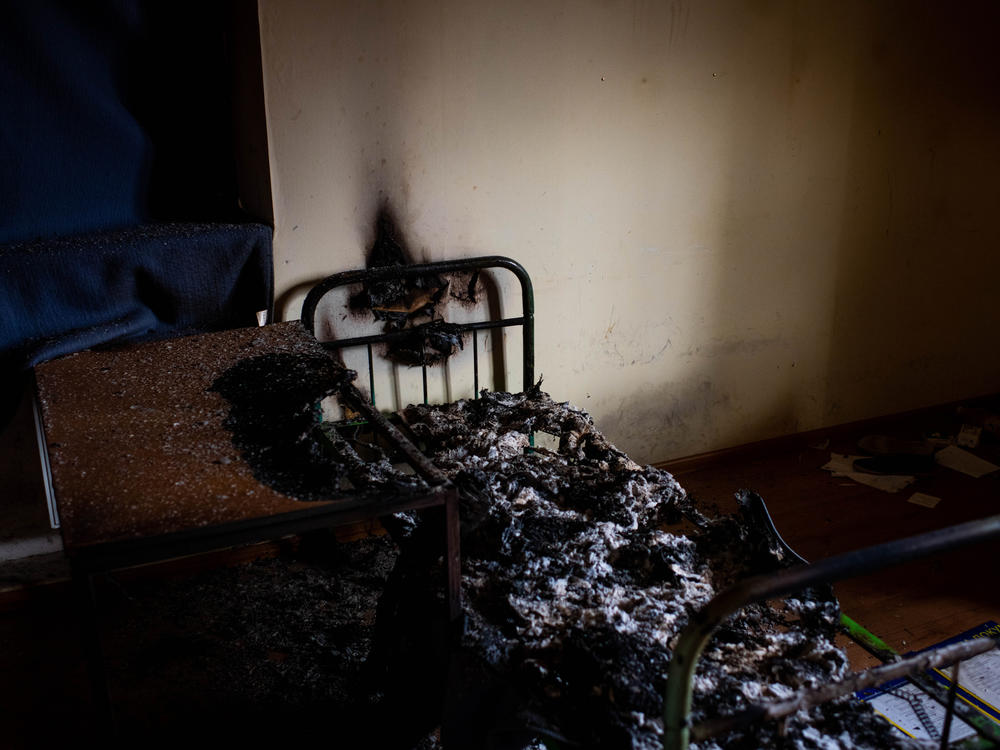 A burned cot in a police station in Kherson on Wednesday. Kherson residents say Russians used the police station to detain and torture violators of curfew and people suspected of collaborating with Ukrainian authorities.