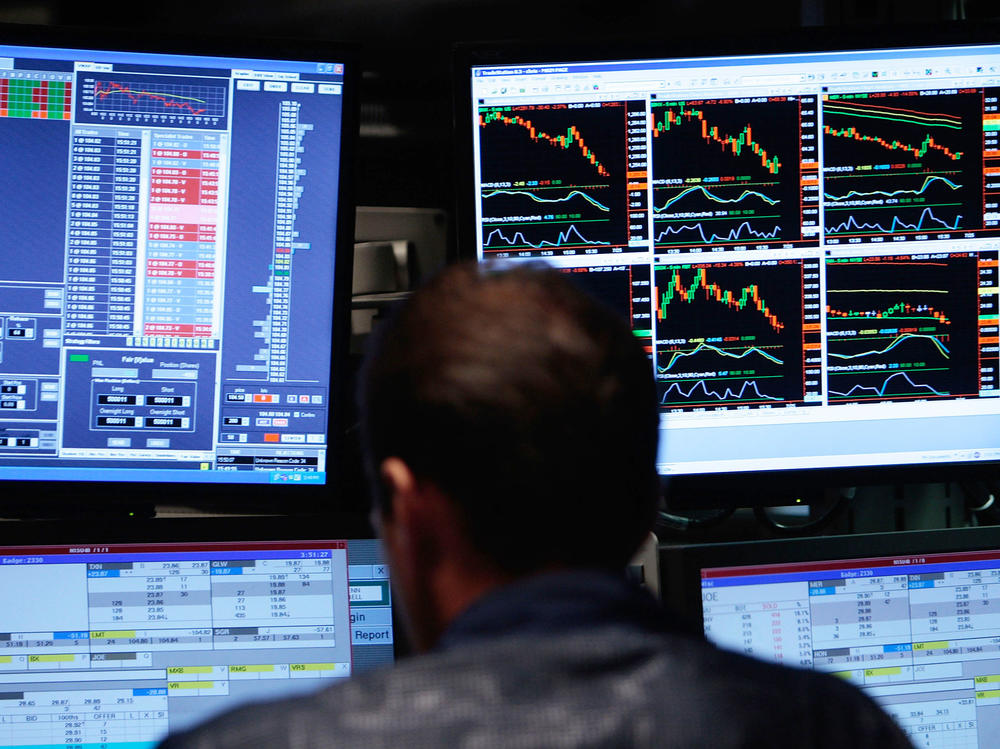 Computer monitors show financial data. More data being created and stored necessitates the use of new unit measurements.