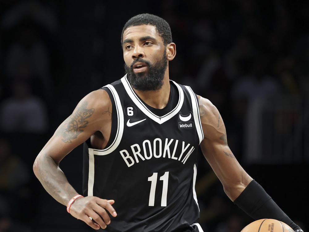 Brooklyn Nets guard Kyrie Irving  dribbles against the Chicago Bulls on Nov. 1 in New York. Irving has returned after a suspension.