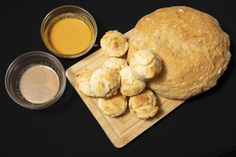 Homemade bread and rolls are paired with baby food, a cheaper alternative to butter.